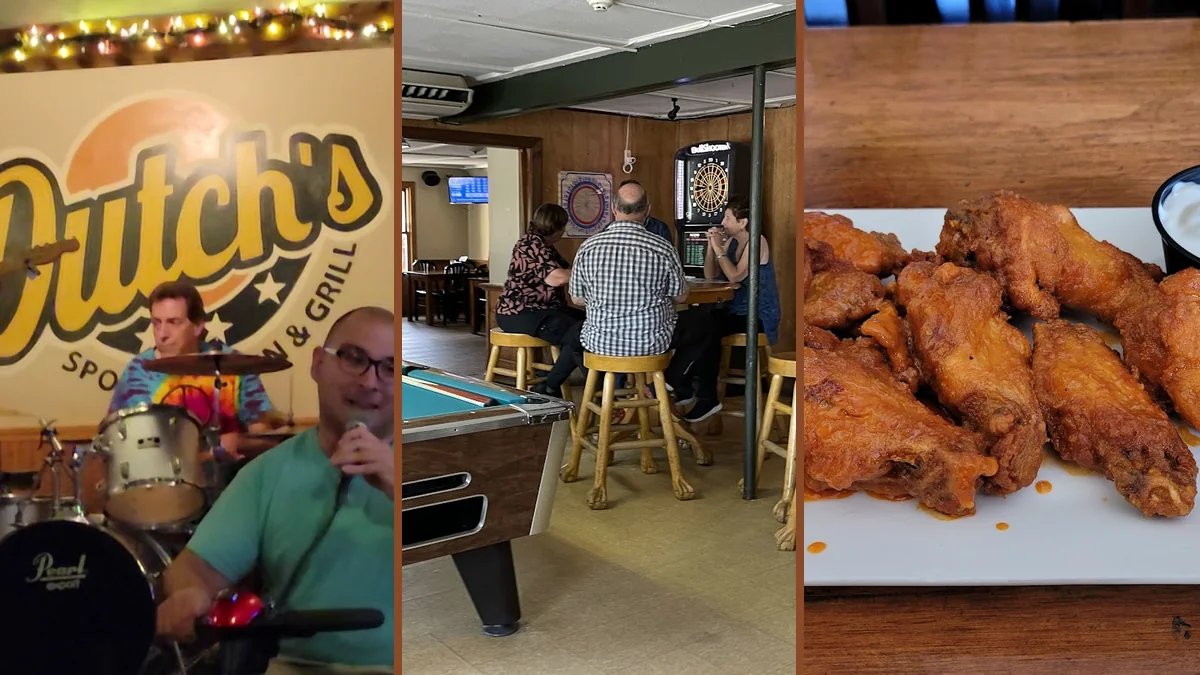Bar seating with plates of wings and fries.