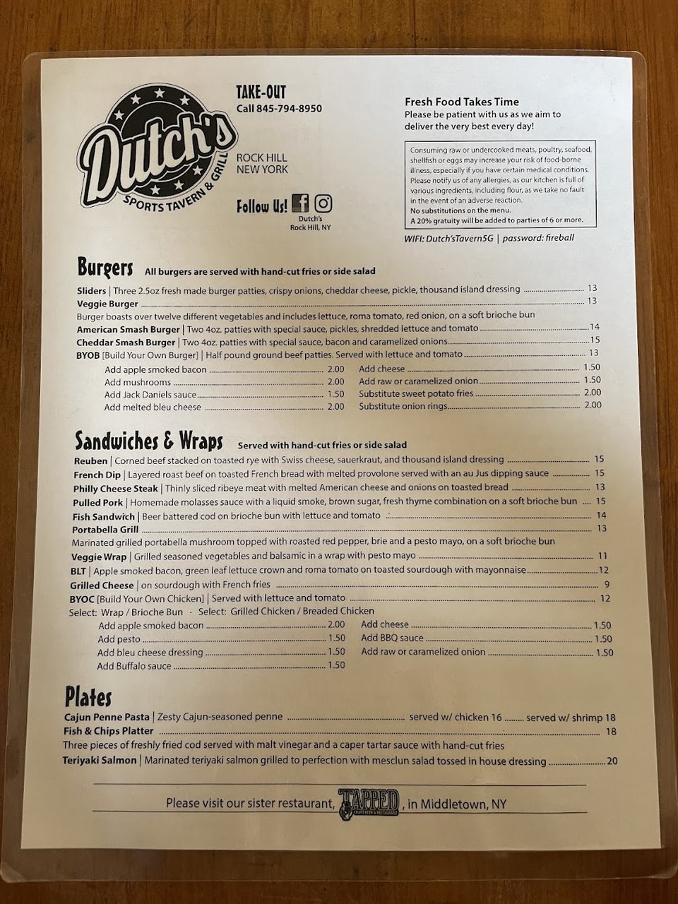 Food menu with happy hour and brunch items.
